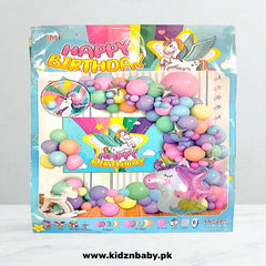 Unicorn theme birthday party combo set with gold horn, pastel balloons, banner, and swirls