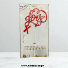 Elegant script "Love" cake topper in gold glitter for wedding reception decor