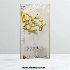 Glittery blue "It's A Boy" cake topper for baby shower celebration