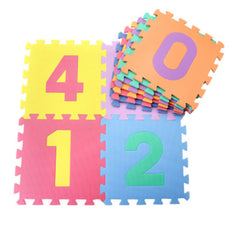 Colorful foam number mats on a white background