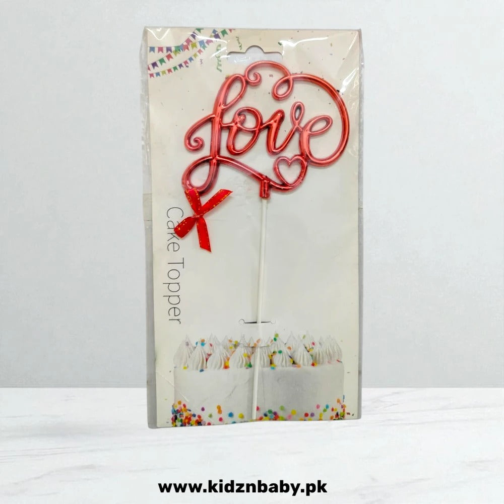 Elegant script "Love" cake topper in gold glitter for wedding reception decor