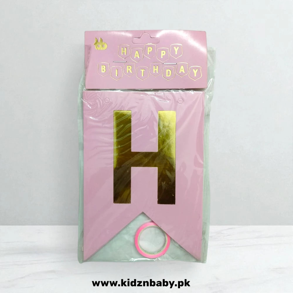 Pink birthday banner with gold letter 'H' on a white background