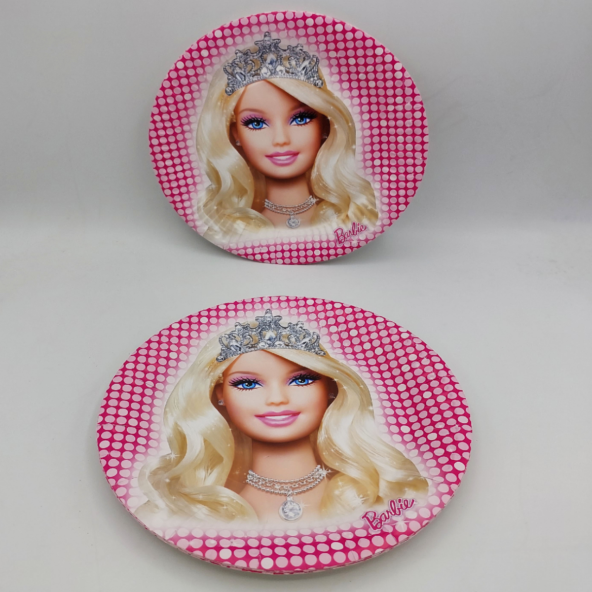 Barbie Disposable Plates featuring a pink-themed Barbie design, perfect for girls' birthday parties.