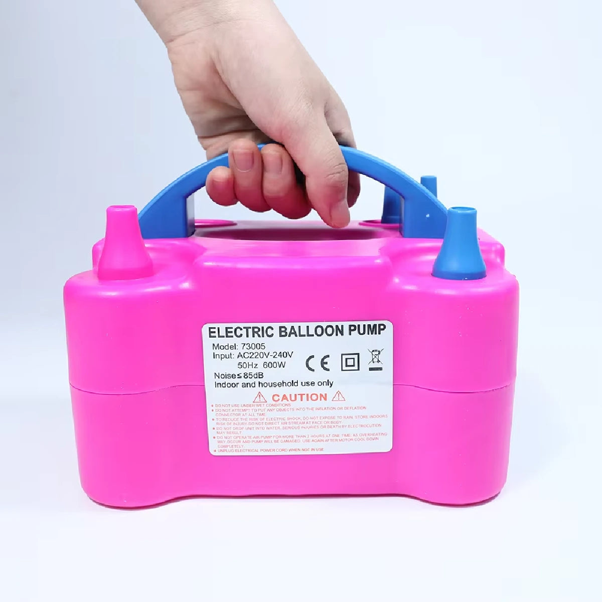 Electric balloon inflator pump in use at kids birthday party – safe and easy to operate